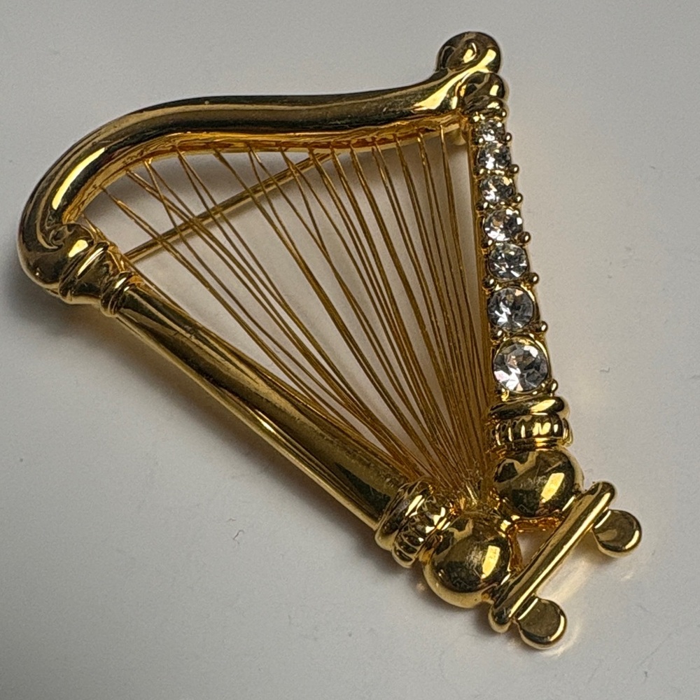 Elegant Gold Harp Brooch with Crystals